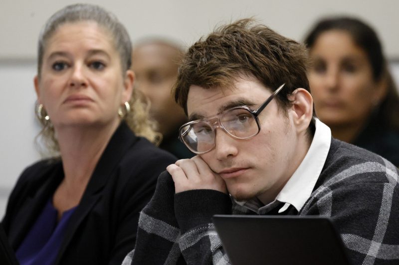 Marjory Stoneman Douglas High School shooter Nikolas Cruz is shown at the defense table after the defense team announced their intention to rest their case during the penalty phase of Cruz's trial at the Broward County Courthouse in Fort Lauderdale on Wednesday, Sept. 14, 2022. Cruz previously plead guilty to all 17 counts of premeditated murder and 17 counts of attempted murder in the 2018 shootings. (Amy Beth Bennett/South Florida Sun Sentinel via AP, Pool)